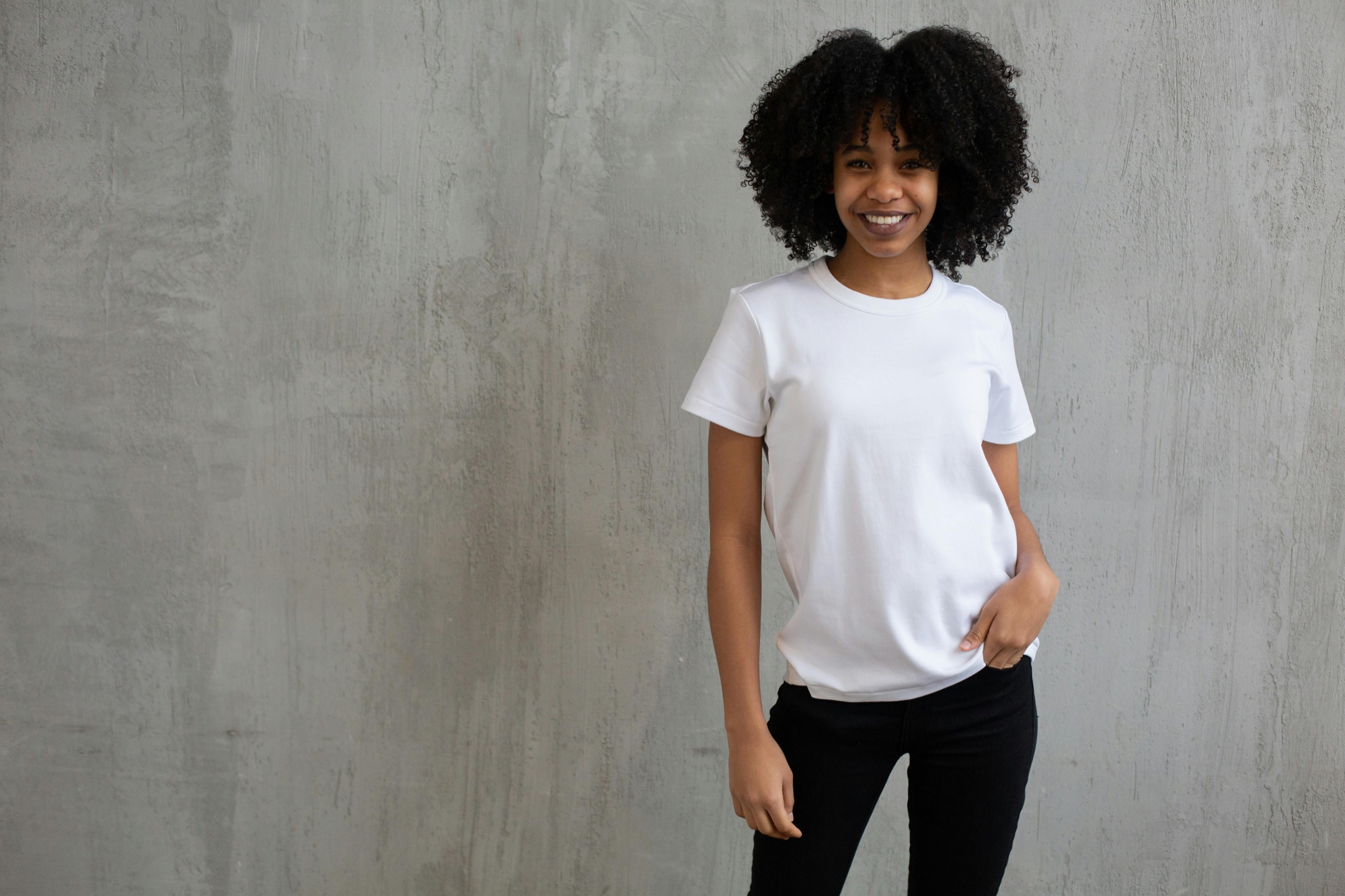 White heavyweight tee against concrete