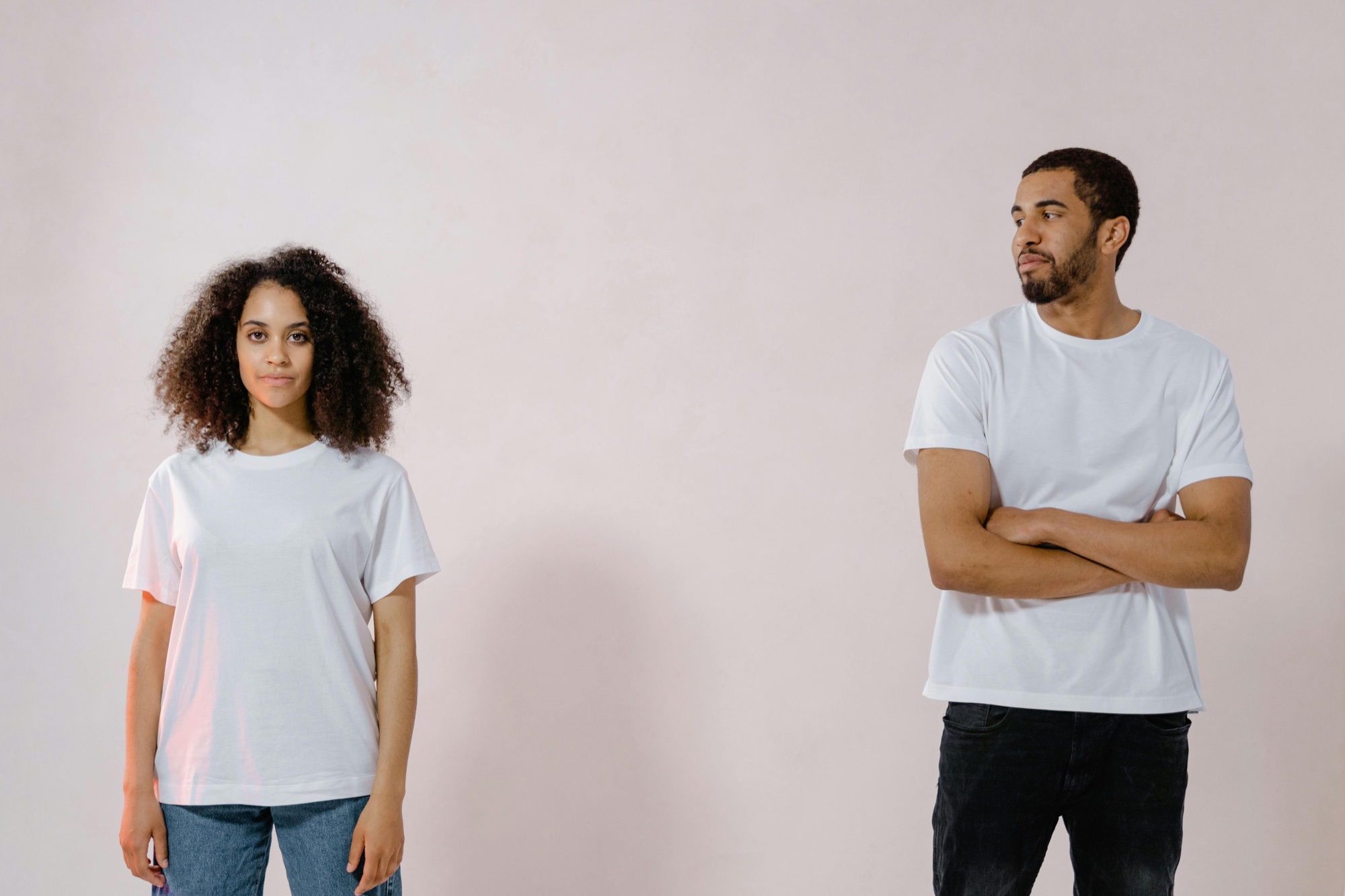 Two models in white heavyweight tees