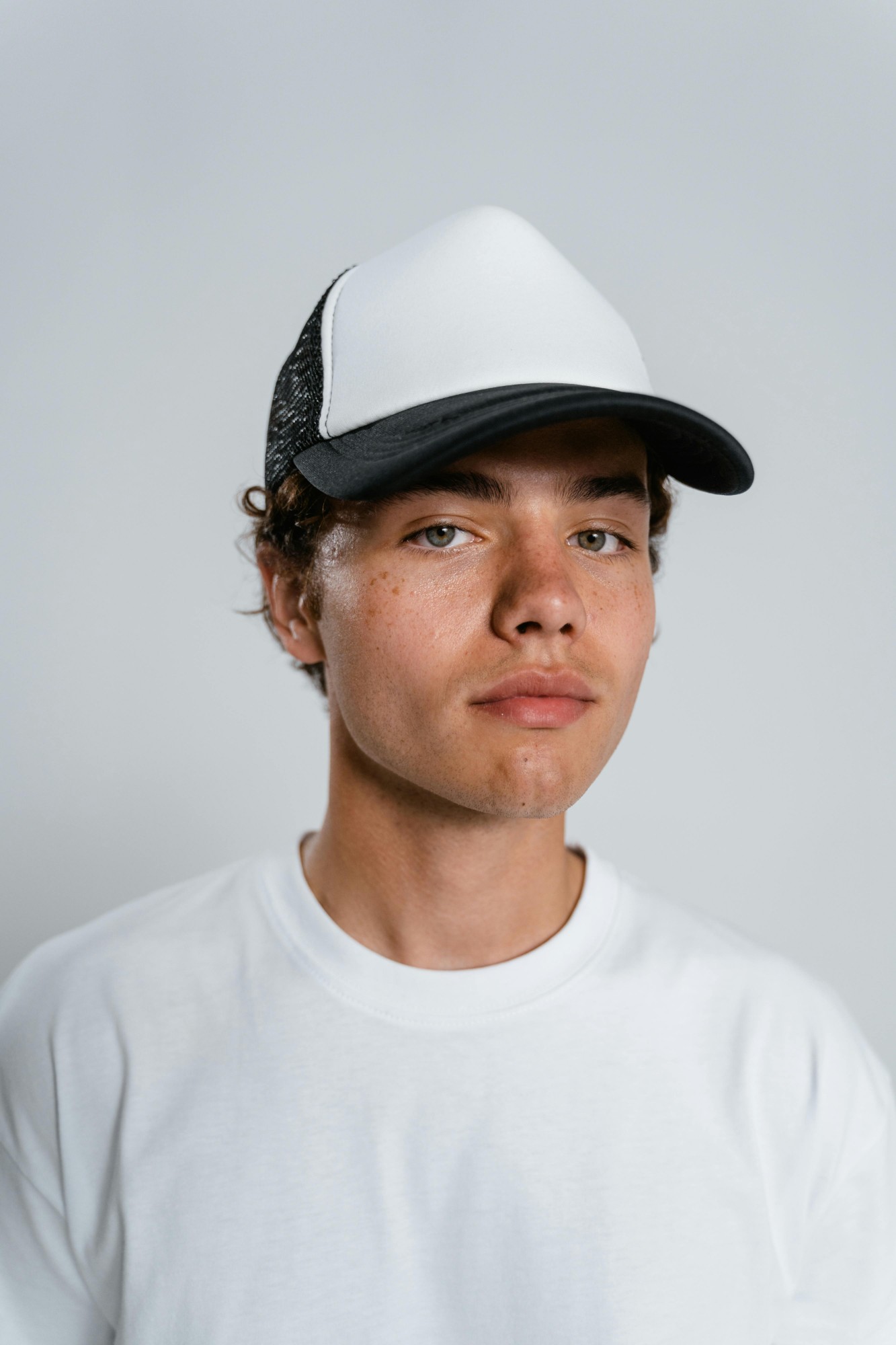 White tee styled with cap